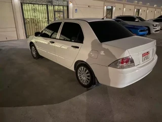 للبيع  سيارة لانسر موديل 2011